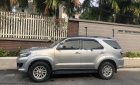 Toyota Fortuner 2.5G 2014 - Bán Toyota Fortuner MT sản xuất 2014, màu bạc xe gia đình 