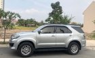 Toyota Fortuner 2.5G 2014 - Bán Toyota Fortuner MT sản xuất 2014, màu bạc xe gia đình 