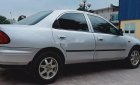 Mazda 323 1999 - Bán Mazda 323 đời 1999, màu trắng