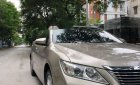 Toyota Camry 2013 - Cần bán gấp Toyota Camry năm 2013, màu vàng