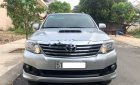 Toyota Fortuner 2.5G 2014 - Bán Toyota Fortuner MT sản xuất 2014, màu bạc xe gia đình 