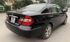 Toyota Camry  MT 2002 - Bán Toyota Camry MT đời 2002, màu đen