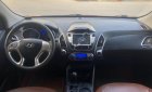 Hyundai Tucson 2.0AT 2011 - Cần bán gấp Hyundai Tucson 2.0AT năm 2011, màu đỏ, xe nhập số tự động