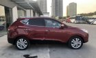 Hyundai Tucson 2.0AT 2011 - Cần bán gấp Hyundai Tucson 2.0AT năm 2011, màu đỏ, xe nhập số tự động