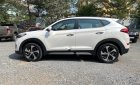 Hyundai Tucson 2018 - Cần bán Hyundai Tucson năm sản xuất 2018, màu trắng mới chạy 2000km, 880tr