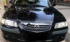 Mazda 626 2001 - Cần bán lại xe Mazda 626 đời 2001, màu đen số sàn giá cạnh tranh