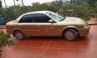 Ford Laser 2000 - Bán ô tô Ford Laser đời 2000, màu vàng như mới