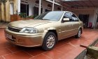 Ford Laser 2000 - Bán ô tô Ford Laser đời 2000, màu vàng như mới