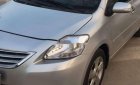 Toyota Vios  E  2009 - Cần bán gấp Toyota Vios E đời 2009, màu bạc xe gia đình