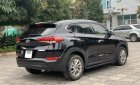 Hyundai Tucson 2.0 AT 2015 - Bán xe Hyundai Tucson 2.0 AT sản xuất năm 2015, màu đen, nhập khẩu nguyên chiếc, giá chỉ 715 triệu