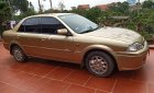 Ford Laser   2000 - Cần bán xe Ford Laser Deluxe 1.6 MT năm 2000, màu vàng như mới, 115 triệu