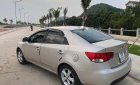 Kia Forte EX 1.6 MT 2011 - Cần bán Kia Forte EX 1.6 MT đời 2011, màu vàng, giá 295tr