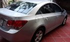 Chevrolet Cruze  LS  2011 - Chính chủ bán gấp Chevrolet Cruze LS năm sản xuất 2011, màu bạc 