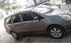 Nissan Livina   2011 - Bán ô tô Nissan Livina năm sản xuất 2011, màu xám số sàn