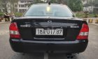 Mazda 323 2002 - Bán xe Mazda 323 năm 2002, màu đen, nhập khẩu nguyên chiếc chính chủ