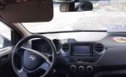 Hyundai Grand i10     2014 - Cần bán Hyundai Grand i10 sản xuất 2014, màu trắng, xe nhập chính chủ, giá tốt