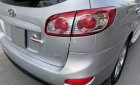 Hyundai Santa Fe 2010 - Cần bán gấp Hyundai Santa Fe SLX AT sản xuất 2010, màu bạc, nhập khẩu nguyên chiếc xe gia đình