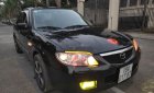 Mazda 323 2002 - Bán xe Mazda 323 năm 2002, màu đen, nhập khẩu nguyên chiếc chính chủ