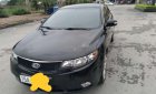 Kia Forte 2009 - Cần bán lại xe Kia Forte AT đời 2009, màu đen, xe nhập, giá chỉ 320 triệu