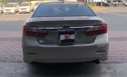 Toyota Camry 2013 - Cần bán Toyota Camry đời 2013, màu vàng