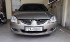 Mitsubishi Lancer 2004 - Bán Mitsubishi Lancer đời 2004, màu vàng, giá chỉ 235 triệu