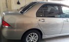 Mitsubishi Lancer 2004 - Bán Mitsubishi Lancer đời 2004, màu vàng, giá chỉ 235 triệu