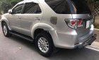 Toyota Fortuner 2014 - Cần bán Toyota Fortuner năm 2014, màu bạc số sàn, giá 606tr