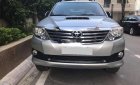 Toyota Fortuner 2014 - Cần bán Toyota Fortuner năm 2014, màu bạc số sàn, giá 606tr