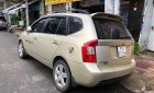 Kia Carens 2010 - Bán xe Kia Carens AT đời 2010, màu vàng chính chủ, 300tr