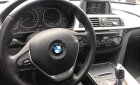 BMW 3 Series   2015 - Bán ô tô BMW 320i sản xuất 2015, màu đen, form 2016