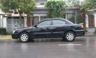 Kia Spectra   2007 - Cần bán xe Kia Spectra sản xuất năm 2007, màu đen, nhập khẩu 