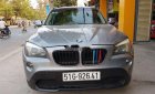 BMW X1   2010 - Cần bán xe BMW X1 đời 2010, màu bạc, xe nhập