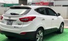 Hyundai Tucson 2014 - Cần bán Hyundai Tucson 2014, màu trắng, 660 triệu