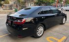 Toyota Camry 2016 - Cần bán Toyota Camry 2.0E năm sản xuất 2016, màu đen, 820tr