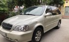 Kia Carnival 2009 - Bán xe Kia Carnival GS AT sản xuất 2009, màu vàng chính chủ