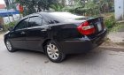 Toyota Camry 2002 - Cần bán gấp Toyota Camry sản xuất 2002, màu đen