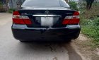 Toyota Camry 2002 - Cần bán gấp Toyota Camry sản xuất 2002, màu đen