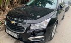 Chevrolet Cruze 2015 - Bán Chevrolet Cruze LT 1.6 MT 2015, màu đen xe gia đình