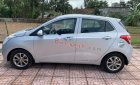 Hyundai Grand i10 2015 - Cần bán xe Hyundai Grand i10 sản xuất năm 2015, màu bạc, xe nhập chính chủ