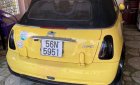 Mini Cooper 2006 - Cần bán lại xe Mini Cooper AT đời 2006, màu vàng, nhập khẩu