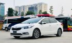 Kia K3 2014 - Cần bán gấp Kia K3 2.0 AT sản xuất năm 2014, màu trắng