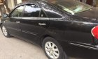 Toyota Camry   2003 - Bán Toyota Camry 3.0V sản xuất 2003, màu đen, xe gia đình