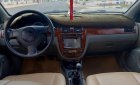 Daewoo Lacetti 2005 - Bán Daewoo Lacetti 1.8 sản xuất 2005, màu trắng, giá 135tr