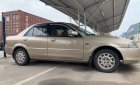 Ford Laser 2001 - Bán xe Ford Laser sản xuất năm 2001, màu vàng xe gia đình