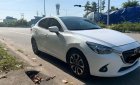 Mazda 2 2015 - Cần bán gấp Mazda 2 đời 2015, màu trắng, xe nhập chính chủ