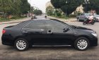 Toyota Camry 2014 - Cần bán gấp Toyota Camry 2.0E năm 2014, màu đen, 670tr