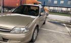 Ford Laser 2001 - Bán xe Ford Laser sản xuất năm 2001, màu vàng xe gia đình