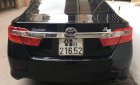 Toyota Camry 2014 - Cần bán gấp Toyota Camry 2.0E năm 2014, màu đen, 670tr