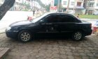 Kia Spectra 2005 - Cần bán gấp Kia Spectra năm 2005, màu đen