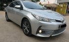 Toyota Corolla altis 1.8G 2018 - Cần bán xe Toyota Altis 1.8G AT 2018 màu bạc, xe đi ít giữ kĩ chính hãng Toyota Sure